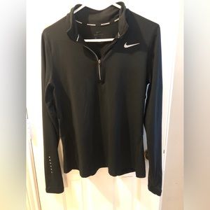 Women’s Nike Running 1/2 zip Running pullover.